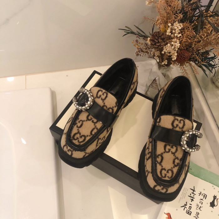 G*u*i loafers