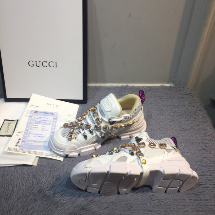 G*u*i sports shoes