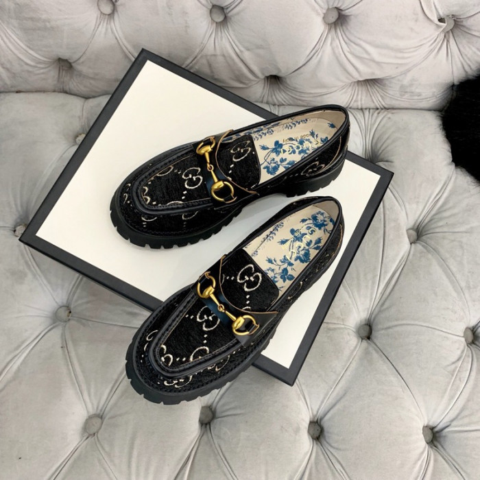G*u*i loafers